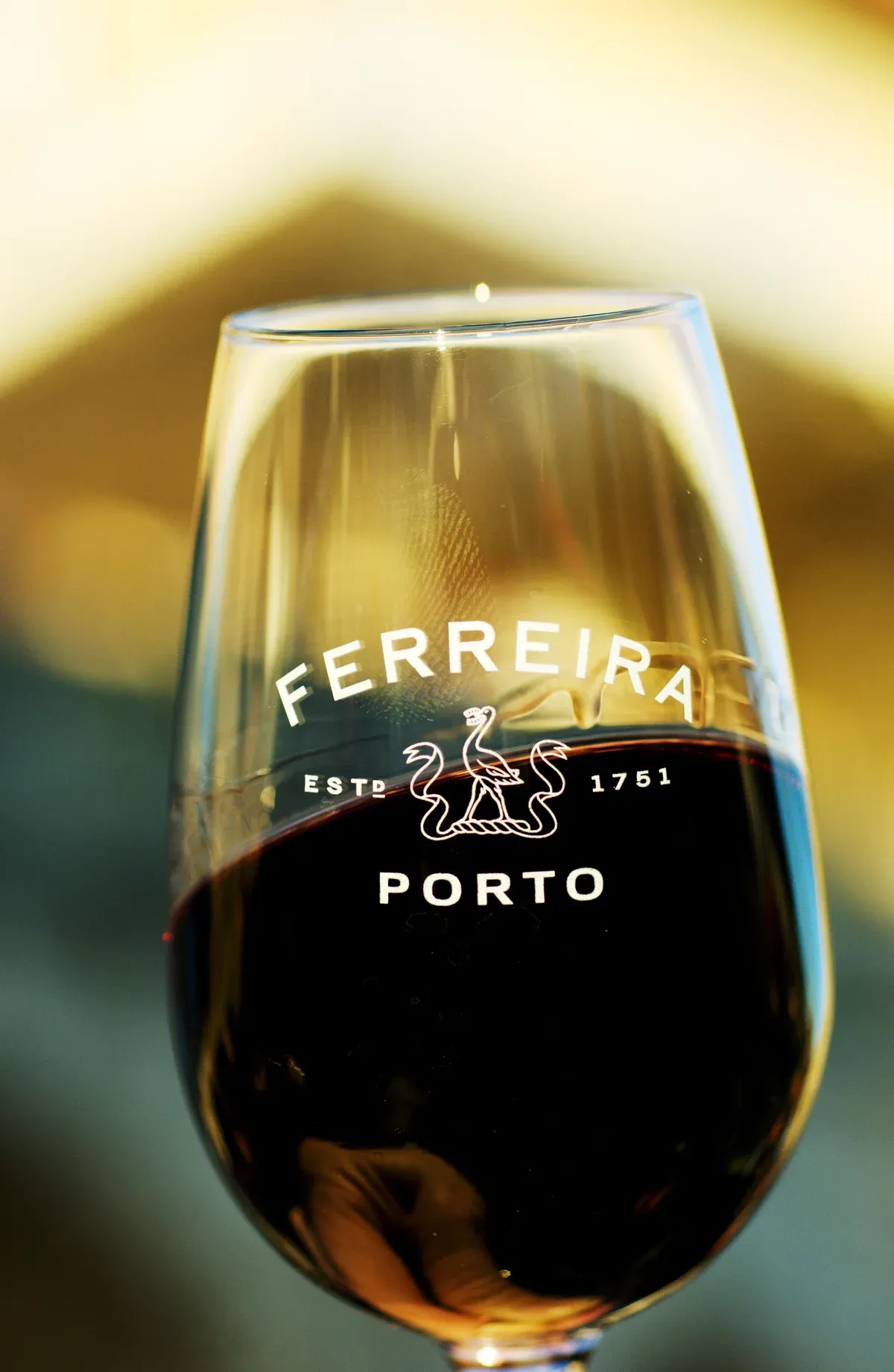 A glass of Ferreira tawny port, the style poured on Ferreira visits and on Porto wine tours